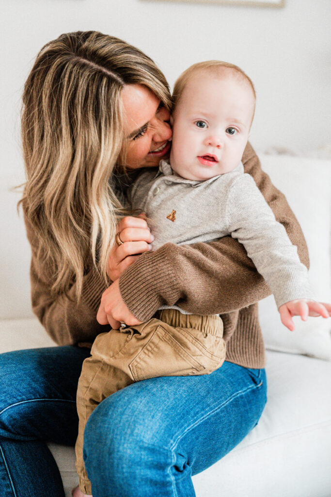 mom and son snuggling in their Minneapolis home during their lifestyle family photoshoot